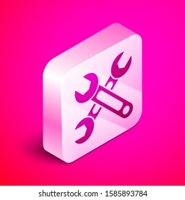 Isometric Wrench icon isolated on pink background. Spanner icon. Silver square button. Vector Illustration