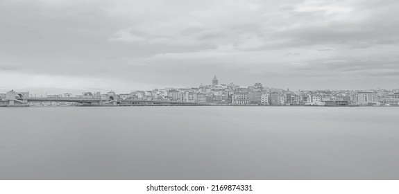 Istanbul and Karakoy view in cloudy weather and early morning from Eminonu coastline