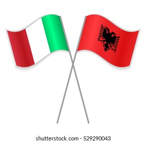 Italian and Albanian crossed flags. Italy combined with Albania isolated on white. Language learning, international business or travel concept.