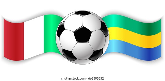 Italian and Gabonese wavy flags with football ball. Italy combined with Gabon isolated on white. Football match or international sport competition concept.
