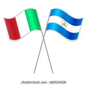 Italian and Nicaraguan crossed flags. Italy combined with Nicaragua isolated on white. Language learning, international business or travel concept.