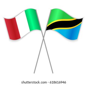 Italian and Tanzanian crossed flags. Italy combined with Tanzania isolated on white. Language learning, international business or travel concept.