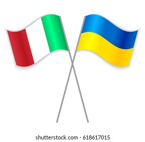 Italian and Ukrainian crossed flags. Italy combined with Ukraine isolated on white. Language learning, international business or travel concept.