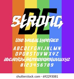 Italic typeface BE strong on pride flag background with sans serif uppercase letters and script small case. Good for bright captions and unforgettable logos.

