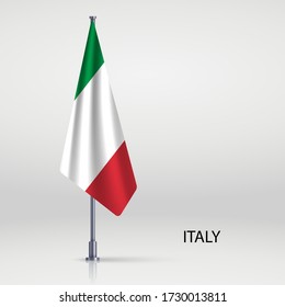 Italy hanging flag on flagpole