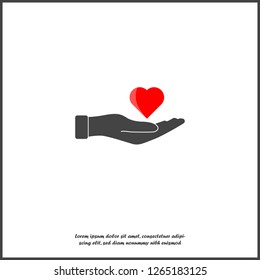 iVector icon of a red hand holding a heart. Flat design of the hand and heart con on white isolated background. Layers grouped for easy editing illustration. For your design.