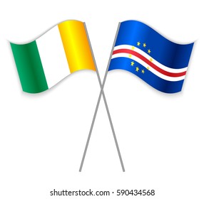 Ivorian and Cabo Verdean crossed flags. Ivory Coast combined with Cape Verde isolated on white. Language learning, international business or travel concept.