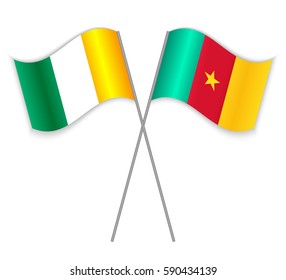 Ivorian and Cameroonian crossed flags. Ivory Coast combined with Cameroon isolated on white. Language learning, international business or travel concept.