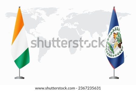Ivory Coast and Belize flags for official meeting against background of world map.