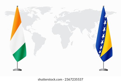 Ivory Coast and Bosnia and Herzegovina flags for official meeting against background of world map.