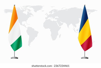 Ivory Coast and Chad flags for official meeting against background of world map.