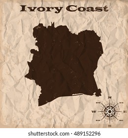 Ivory Coast old map with grunge and crumpled paper. Vector illustration