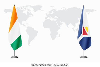 Ivory Coast and Saint Martin flags for official meeting against background of world map.