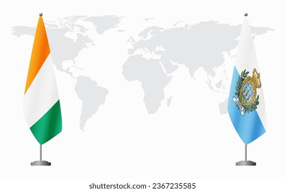 Ivory Coast and San Marino flags for official meeting against background of world map.