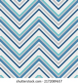 ixelated chevron of blue and white mosaic cells. Vector decor suitable for print and decoration.