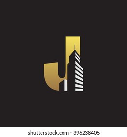 J alphabet building negative space letter logo gold black background
