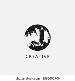 J  Circle  Brush Stroke Letter Logo design. Monogram Black Paint Logo Letter Icon with Elegant circle brush shape Vector Design concept.