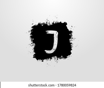J Letter Logo With Black Square Splatter Element. Grunge Retro logo design template.