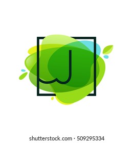 J letter logo in square frame at green watercolor splash background. Green art. Vector ecology typography for your posters, invitations, cards. 