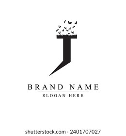 J Logo Letter with Flock of Birds Flying and Disintegrating from the Letter	
