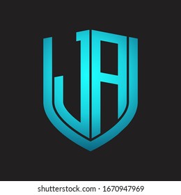 Monograma de logotipo JA con diseño de escudo de emblemas aislado con colores azules sobre fondo negro