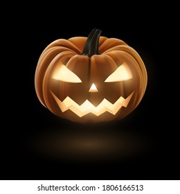 Jack O Lantern halloween pumpkin on black background with light reflection on the floor