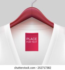 Jacket with label hanging on a hanger. The template for your design or advertising messages.