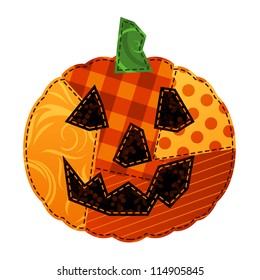 Jack-o-lantern made out of stitched fabric swatches