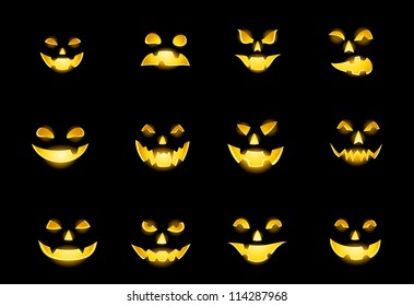 Jack-o-lantern pumpkin faces glowing on black