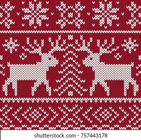 Jacquard seamless pattern with reindeer. Red and white knitted background. Northern winter style. Vector illustration.
