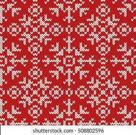 Jacquard winter seamless  pattern. Knitted Red and white background. Northern  style. Vector illustration.
