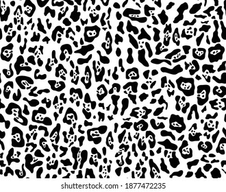 Jaguar pattern, leopard black spots seamless background vector graphics. The skin of a wild cat.