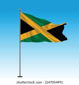 Jamaica flag flying in the blue sky.