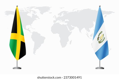 Jamaica and Guatemala flags for official meeting against background of world map.