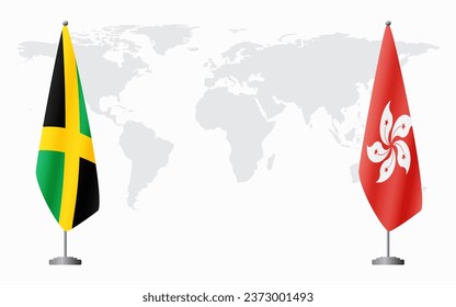 Jamaica and Hong Kong flags for official meeting against background of world map.