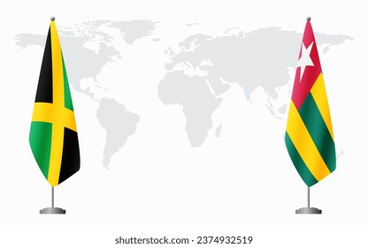 Jamaica and Togo flags for official meeting against background of world map.