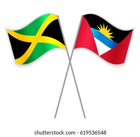 Jamaican and Antiguan crossed flags. Jamaica combined with Antigua and Barbuda isolated on white. Language learning, international business or travel concept.