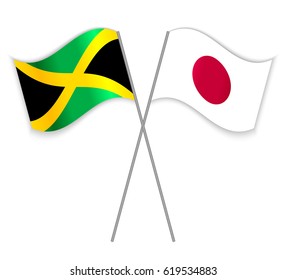 Jamaican and Japanese crossed flags. Jamaica combined with Japan isolated on white. Language learning, international business or travel concept.