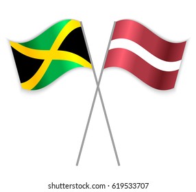 Jamaican and Latvian crossed flags. Jamaica combined with Latvia isolated on white. Language learning, international business or travel concept.