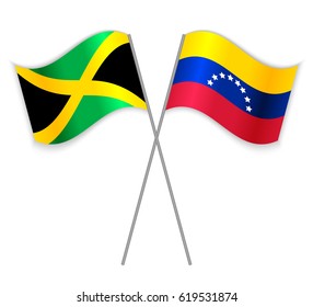 Jamaican and Venezuelan crossed flags. Jamaica combined with Venezuela isolated on white. Language learning, international business or travel concept.