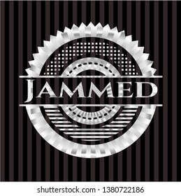 Jammed silver shiny emblem