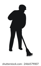 Janitor sweeps with a broom, black silhouette