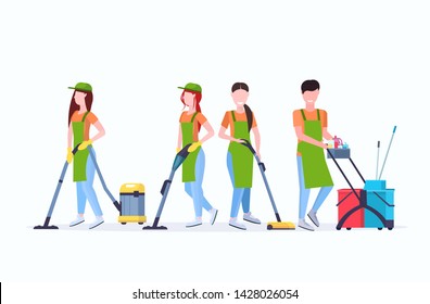 janitors team cleaning service concept male female cleaners in uniform working together with professional equipment flat full length horizontal