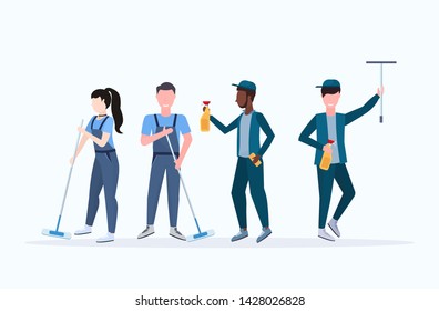 janitors team cleaning service concept woman with mix race men cleaners in uniform working together with professional equipment flat full length horizontal