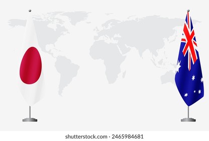 Japan and Australia flags for official meeting against background of world map.