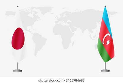 Japan and Azerbaijan flags for official meeting against background of world map.