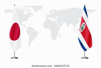 Japan and Costa Rica flags for official meeting against background of world map.