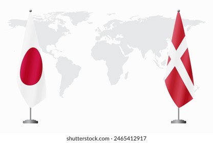 Japan and Denmark flags for official meeting against background of world map.