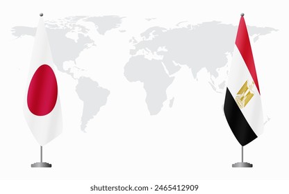 Japan and Egypt flags for official meeting against background of world map.