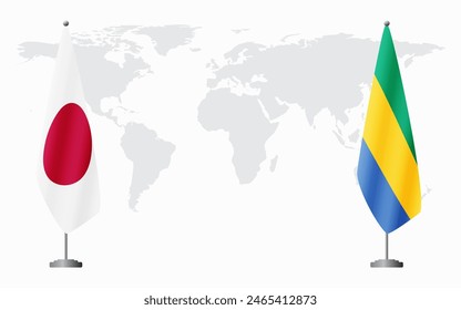 Japan and Gabon flags for official meeting against background of world map.
